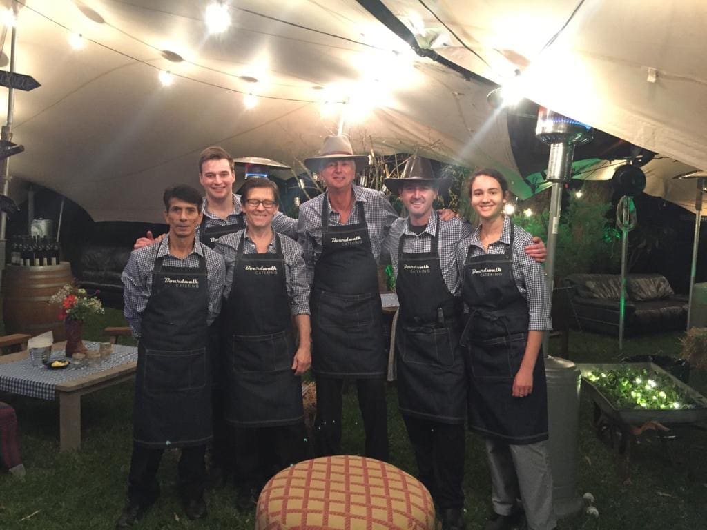 Themed staff uniforms for an event at a clients home
